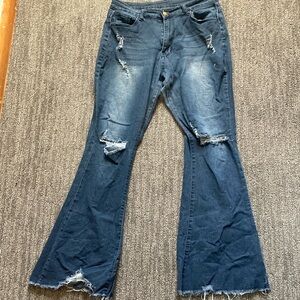 Women's Distressed Blue Jeans